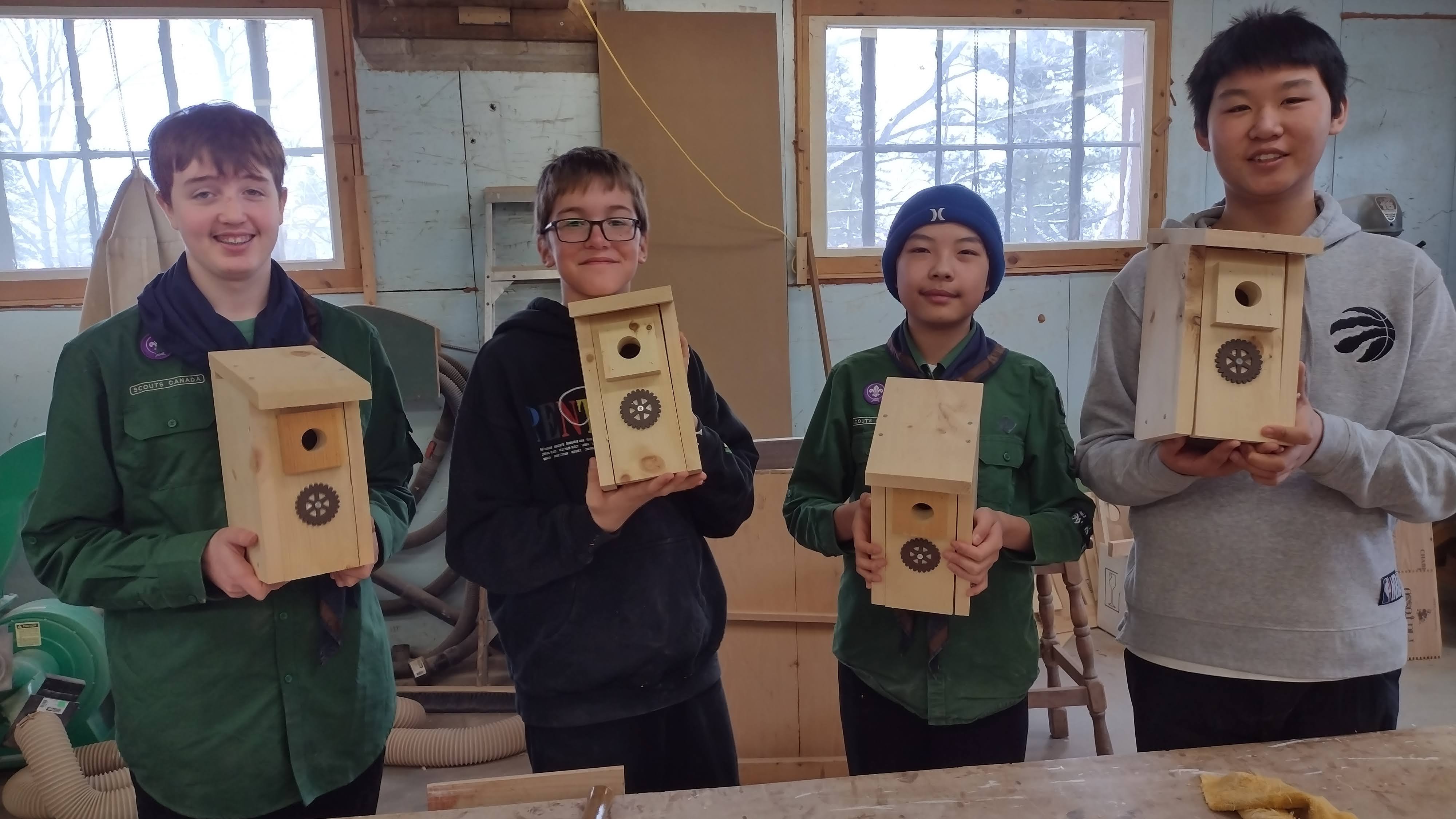 Boy Scouts showing their completed Rotary birdhouses. | Dana Atwell